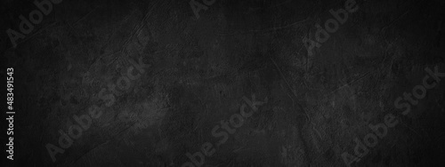 Black anthracite dark gray grey grunge old aged retro vintage stone concrete cement blackboard chalkboard wall floor texture, with cracks - Abstract  background banner panorama pattern design template photo