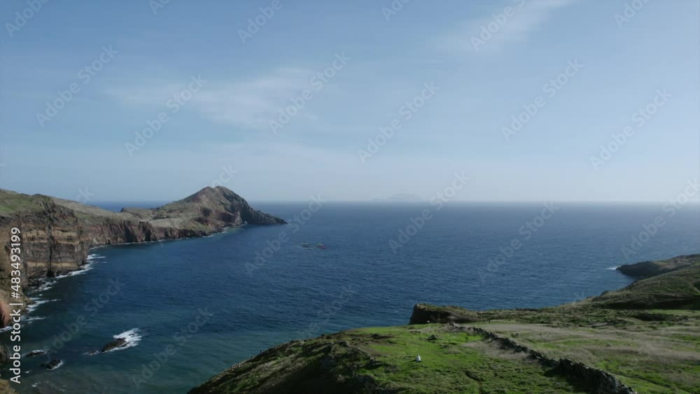 Smooth shooting from the air. Mountains in the middle of the ocean in Portugal on the island of Madeira. HDR 4K