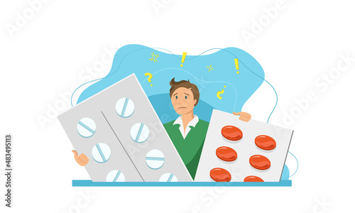 Tiny guy or man holding large pills confused medicine