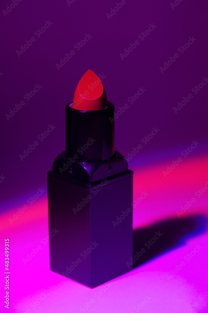 Red lipstick on purple gradient background Red lipstick on purple gradient background