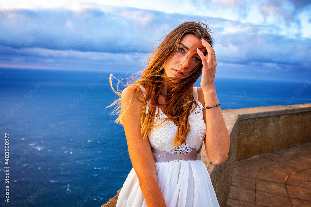 woman in a wedding dress in the mounatins from madeira portugal woman in a wedding dress in the mounatins from madeira portugal