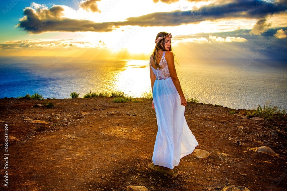 woman in a wedding dress in the mounatins from madeira portugal 