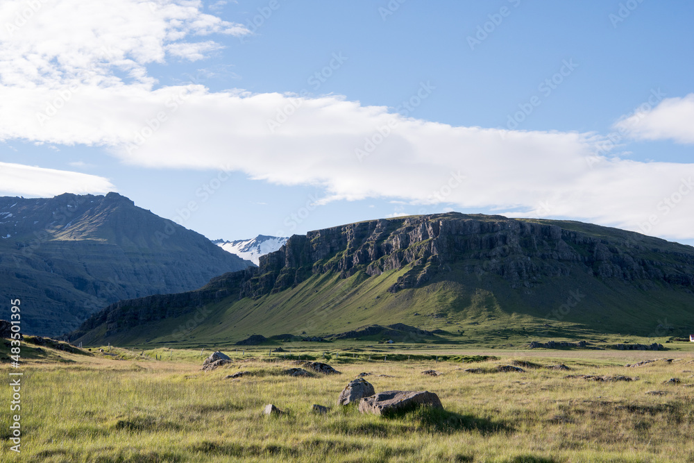 Green Grassy mountain Landscape in the highlands. Travel and nature on a beautiful cold day