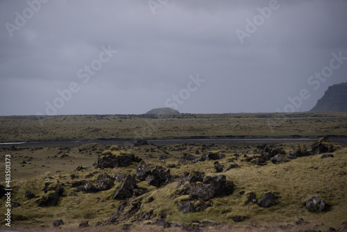 Green Grassy mountain Landscape in the highlands. Travel and nature on a beautiful cold day