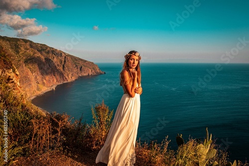 woman in a wedding dress in the mounatins from madeira portugal 