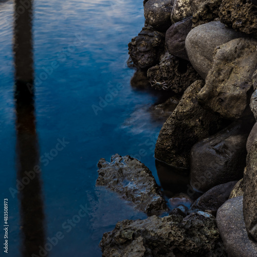 Rocks on a serene blue sea