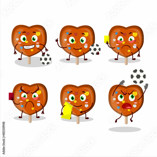 Orange lolipop love cartoon character working as a Football referee