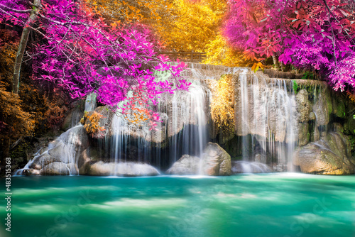 Amazing in nature, beautiful waterfall at colorful autumn forest in fall season. © totojang1977