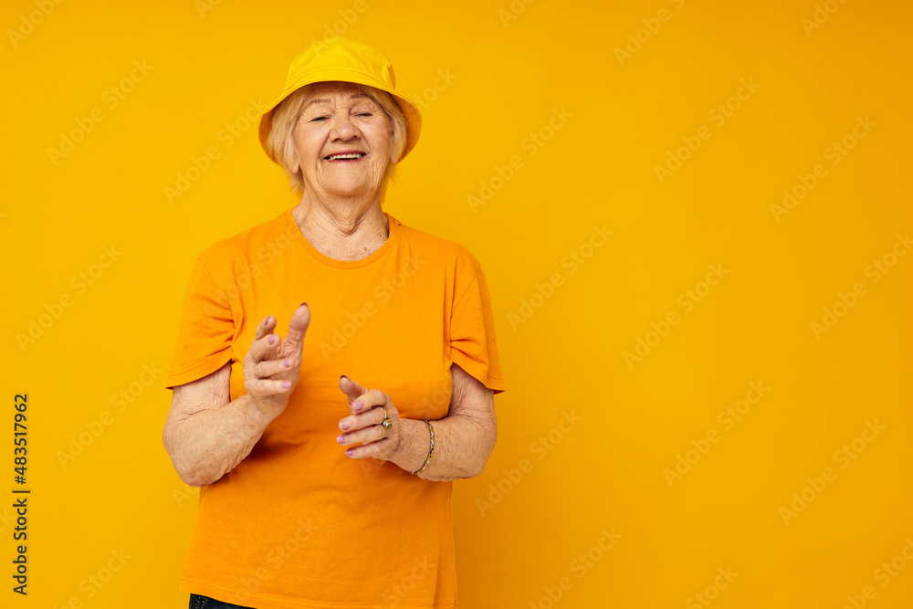 smiling elderly woman posing face grimace joy isolated background