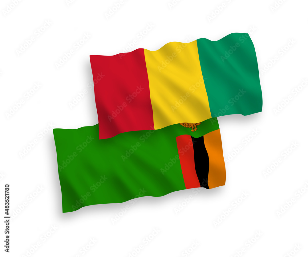Obraz premium National vector fabric wave flags of Republic of Zambia and Guinea isolated on white background. 1 to 2 proportion.