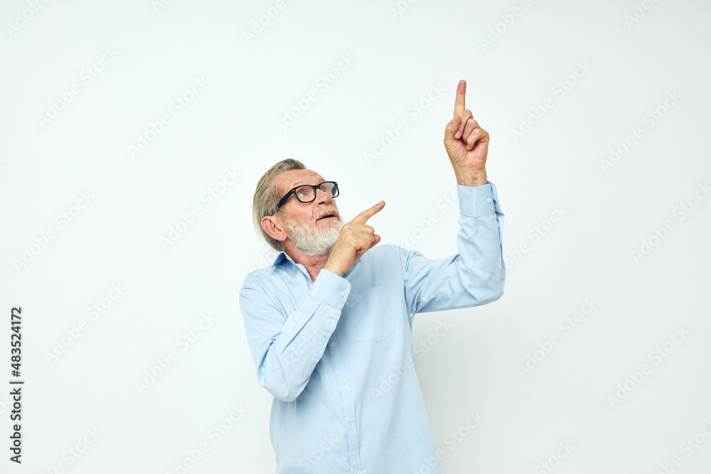 old man in shirt and glasses posing emotions light background old man in shirt and glasses posing emotions light background