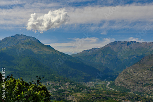 Dalla Madonna della Losa in Val di Susa una vista spettacolare sul fiume Dora e sui paesini di Giaglione e Venaus con nuvole bizzarre sulle Alpi Cozie photo
