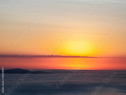 Beautiful Arctic sunset. Scenic colorful sky at dawn. Aerial view of sunrise bright sky. Top View from high altitude.