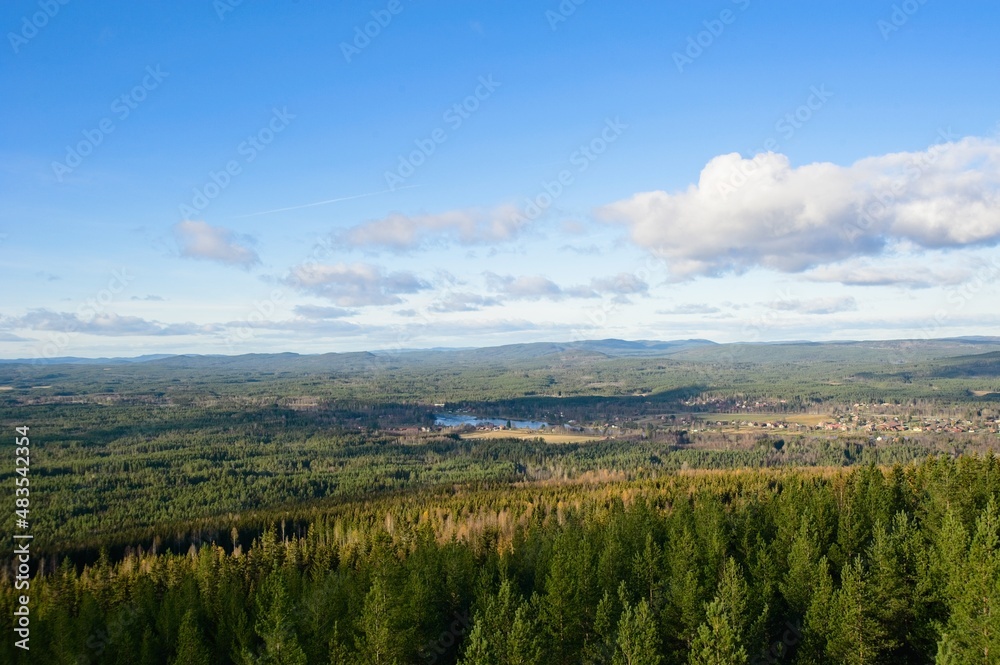 Fototapeta premium Beautiful view over a valley with the smal town of Björbo in Sweden