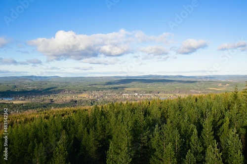 Beautiful view over a valley with the smal town of Bj  rbo in Sweden