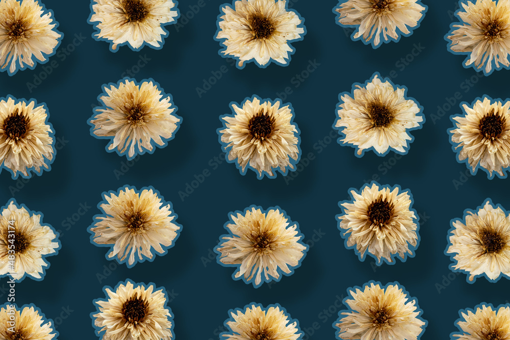 Obraz premium Autumn creative composition. Pattern made of dried flowers on dark background.