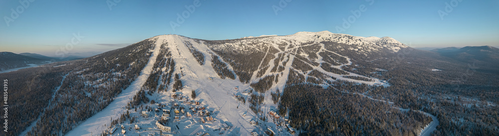 AIR VIEW: panorama of the winter ski resort of Sheregesh. a bird's-eye view of the ski complex with slopes and lifts