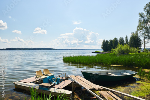 Fototapeta Naklejka Na Ścianę i Meble -  Boat and catamaran on the lake in summer 