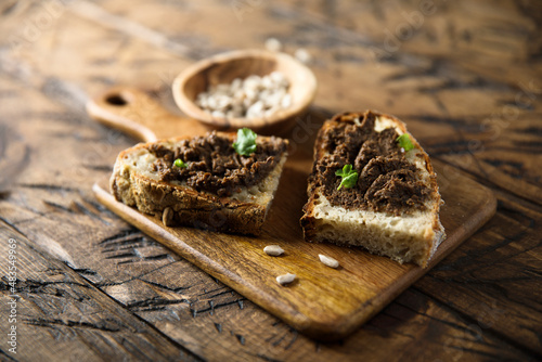 Traditional olive tapenade on toast photo