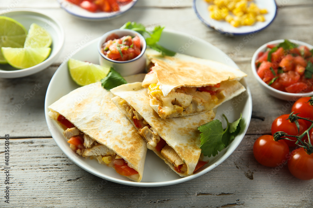 Homemade quesadilla with chicken and tomatoes