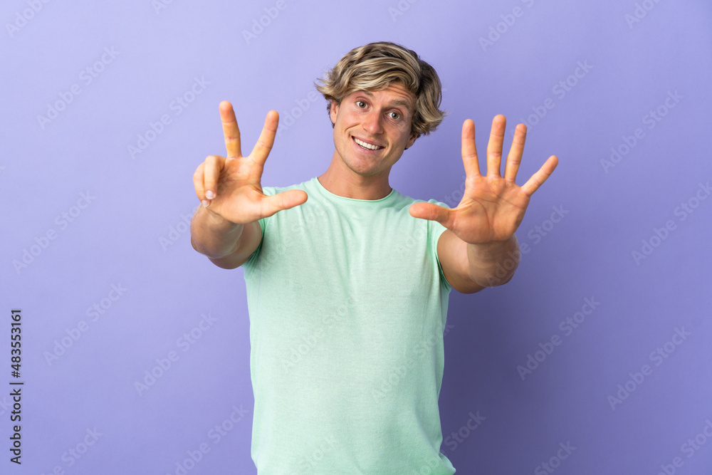 English man over isolated purple background counting eight with fingers English man over isolated purple background counting eight with fingers