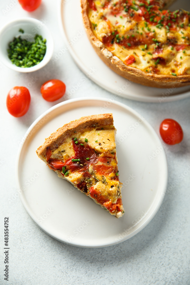 Homemade chicken quiche with tomatoes and pepper Homemade chicken quiche with tomatoes and pepper