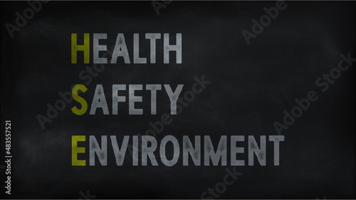 HEALTH SAFETY ENVIRONMENT (HSE) on chalk board 