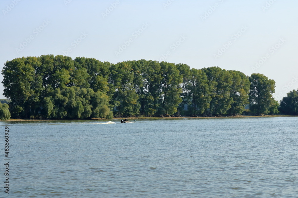 Danube Delta landscape with fishing boat in Romania