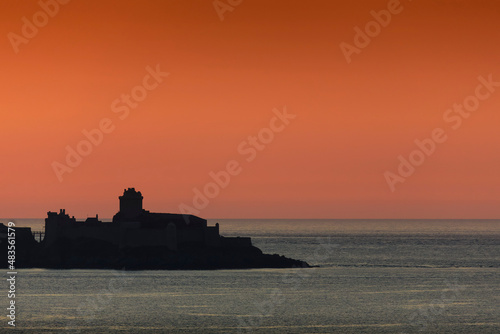 Fort La Latte near Saint Cast le Guildo on Brittany coast from the sea or with sunset