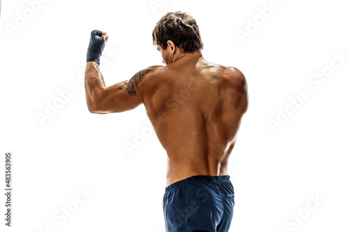 Back view of boxer who training and practicing on white background. sport, healthy lifestyle.