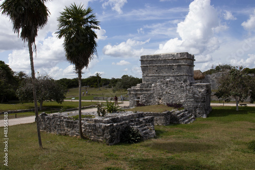 Ancient Mayan ruin in the pre-Columbian city of Tulum, next to Tulum beach in Mexico. Place of vacations and tourists in summer that belonged to the Mayan civilization and is in the Mayan Riviera.