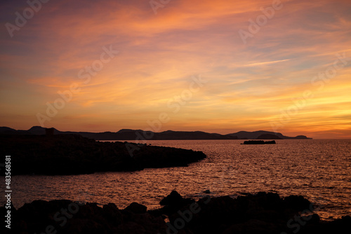 Cala Viola de Ponent, Menorca. September 2021. Magnificent sunset in the Mediterranean Sea. On one of the paradisaical beaches of the island of Menorca. © Xavi Lapuente