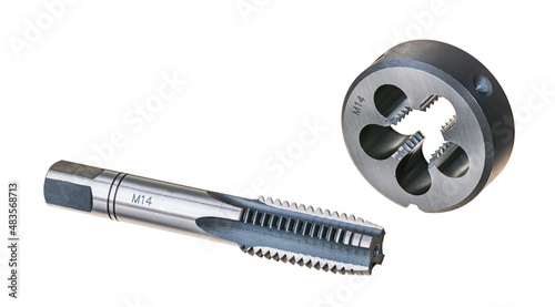 Closeup of steel die and tap cutter isolated on white background. Metric tools for precise tapping and threading. Round part to hand cutting external threads and cylindric to threaded holes in metals. photo