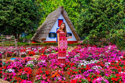 woman in a dress in the garden from santana madeira portugal