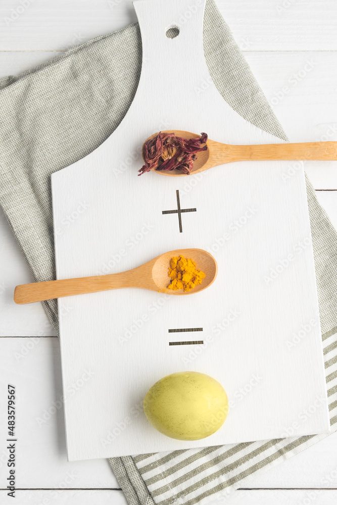 Concept of natural dyes for Easter eggs. Coloring Easter eggs green