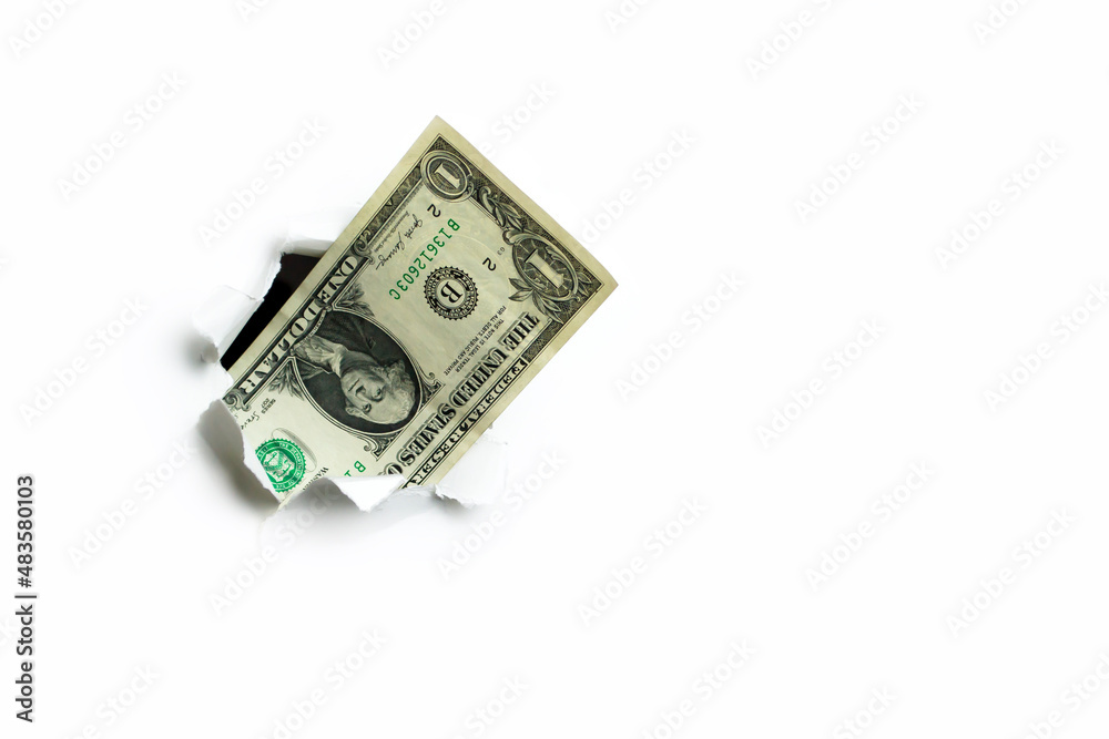 One dollar sticking out of a hole on a white background, incomplete income.