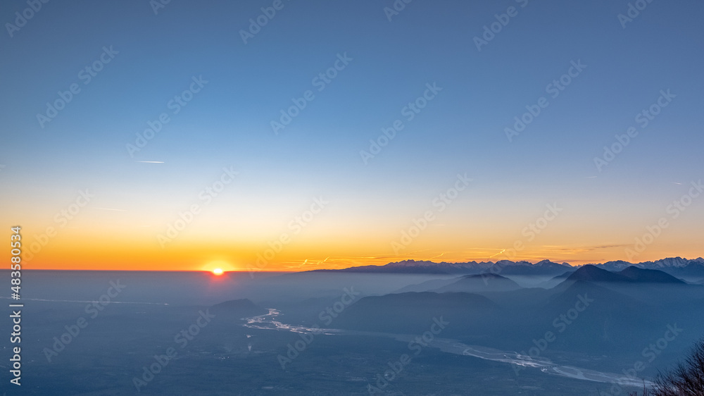Winter sunset from an alpine peak of Friuli-Venezia Giulia Winter sunset from an alpine peak of Friuli-Venezia Giulia