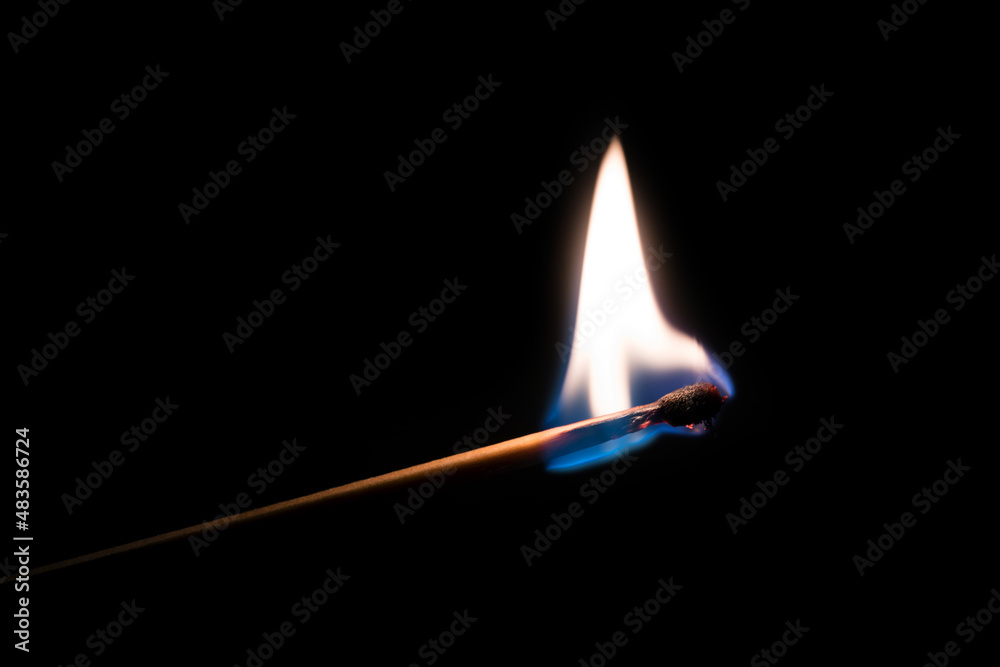 Close p burning match against black background flame - obrazy, fototapety, plakaty 