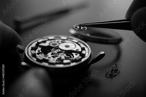 Watchmaker's workshop. Mechanical watch repair. Fix jewelry photo