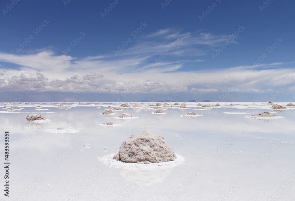 White salt heaps in the salt lake from the salar de uyuni in bolivia, south america White salt heaps in the salt lake from the salar de uyuni in bolivia, south america