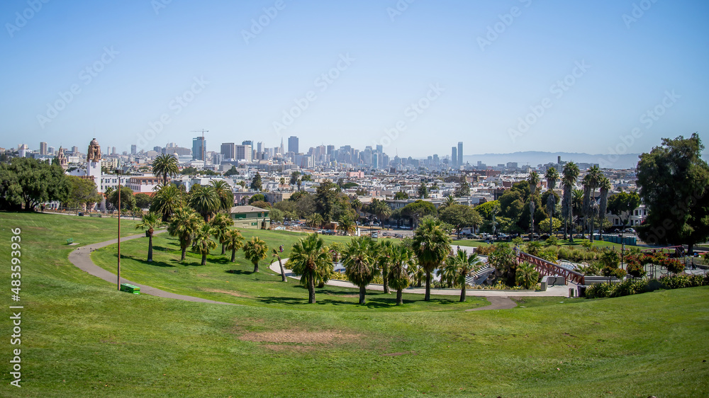 Fototapeta premium San Francisco, California, USA - August 2014: Mission Dolores Park with San Francisco downtown skyline