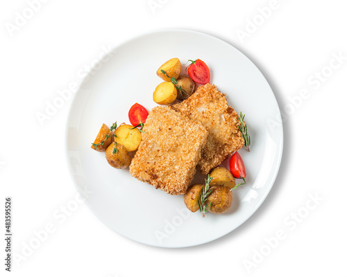 crispy fresh fish with baked potatoes served on the plate