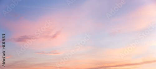 Vászonkép light blue and pink pastel colored panorama sky with clouds