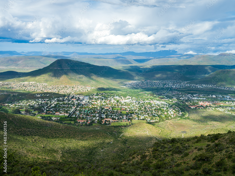 Aerial shot of a small village town of Graaff-Reinet on a cloudy day in the Eastern Cape South Africa
