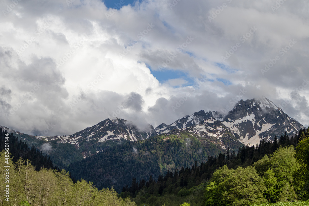 alpine mountains and clouds landscape background