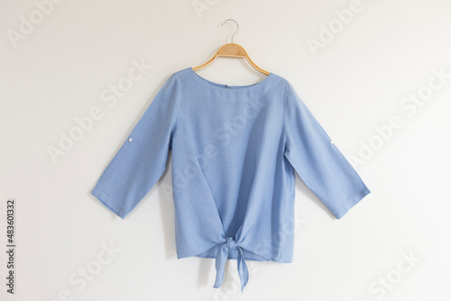 Tableau sur toile blue blouse on hanger.