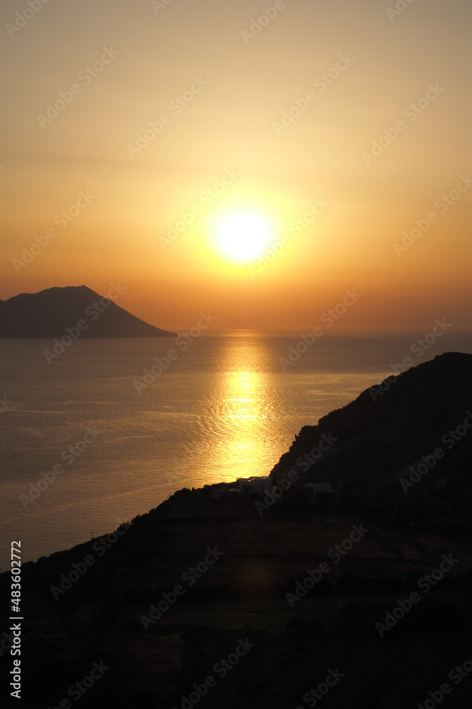 Beautiful sunset from Plaka main village of Milos island, Cyclades, Greece