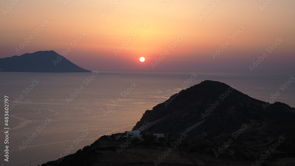 Beautiful sunset from Plaka main village of Milos island, Cyclades, Greece