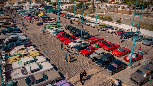 drone aerial high angle photo of colourful car expo in Ayia Napa cyprus photo