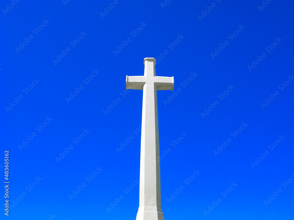 White marble cross in the sky